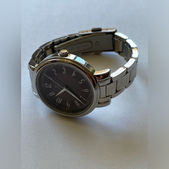 Titan Quartz Analog Watch – Brown Dial, Stainless Steel Strap (Women's) - Picture 6 of 8